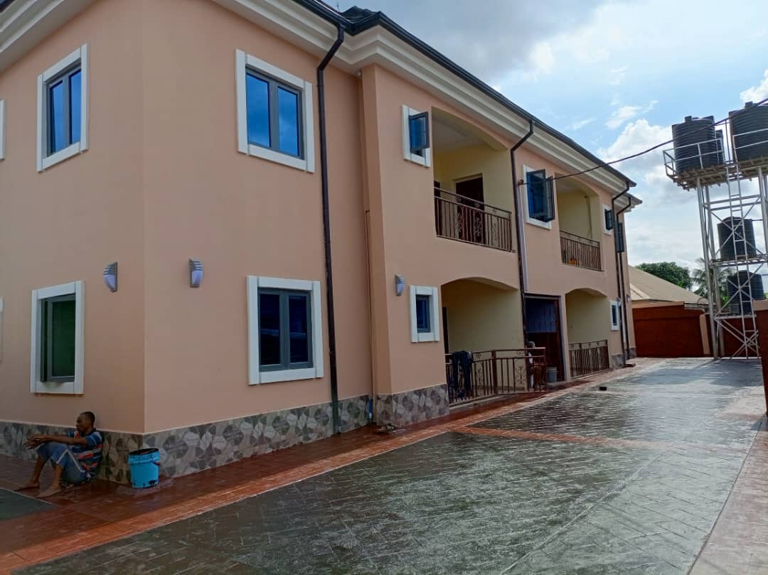 Building exterior showing windows and paving